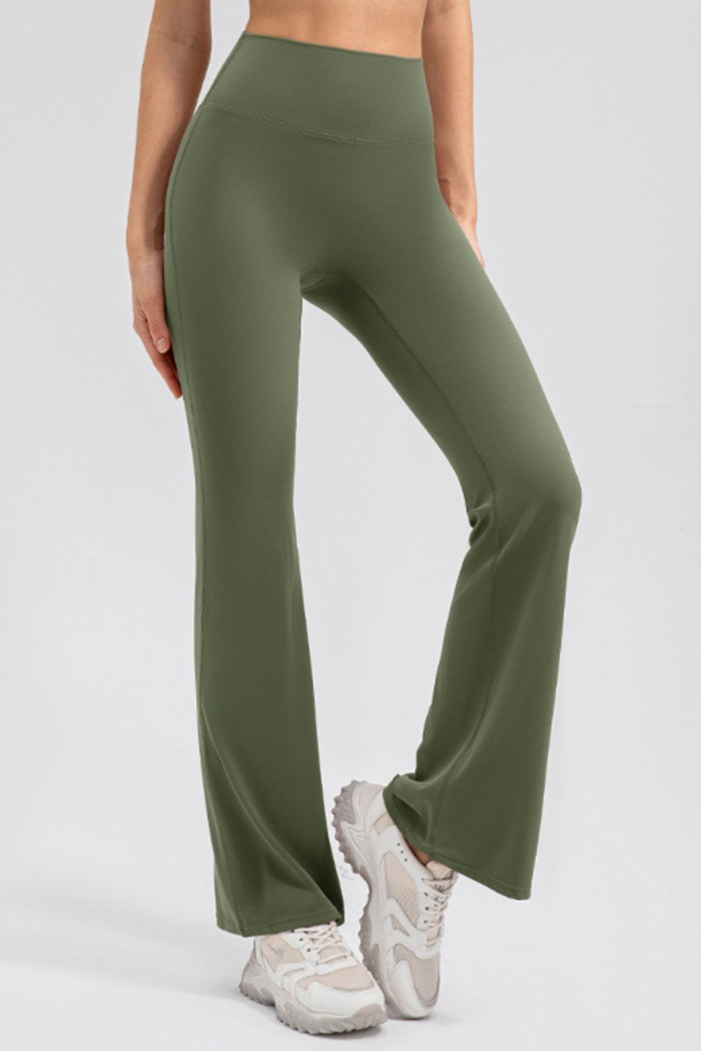 Matcha green flared leggings with a high waist and performance fit.