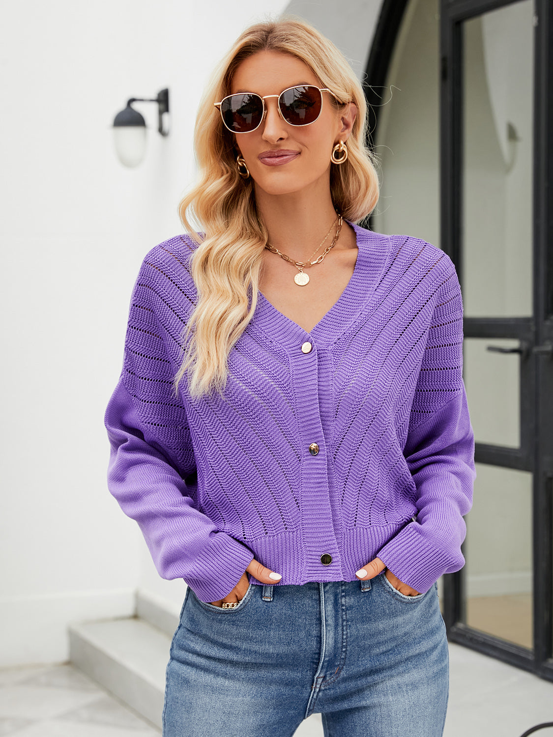 Purple cropped V-neck knit cardigan with chevron pattern and gold buttons