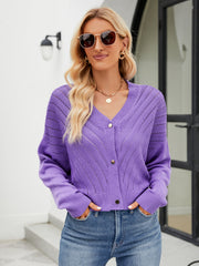 Purple cropped V-neck knit cardigan with chevron pattern and gold buttons