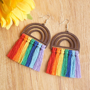 Rainbow fan tassel earrings with wooden rainbow detail and colorful tassels.
