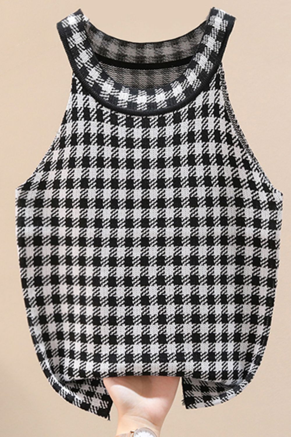 Houndstooth knit halter tank top in black and white acrylic with a scoop neckline.