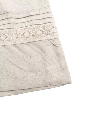 Beige maternity trousers with pleated detail and crochet trim