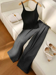 Chic sleeveless black top with dark gray pinstripe wide-leg pants set.