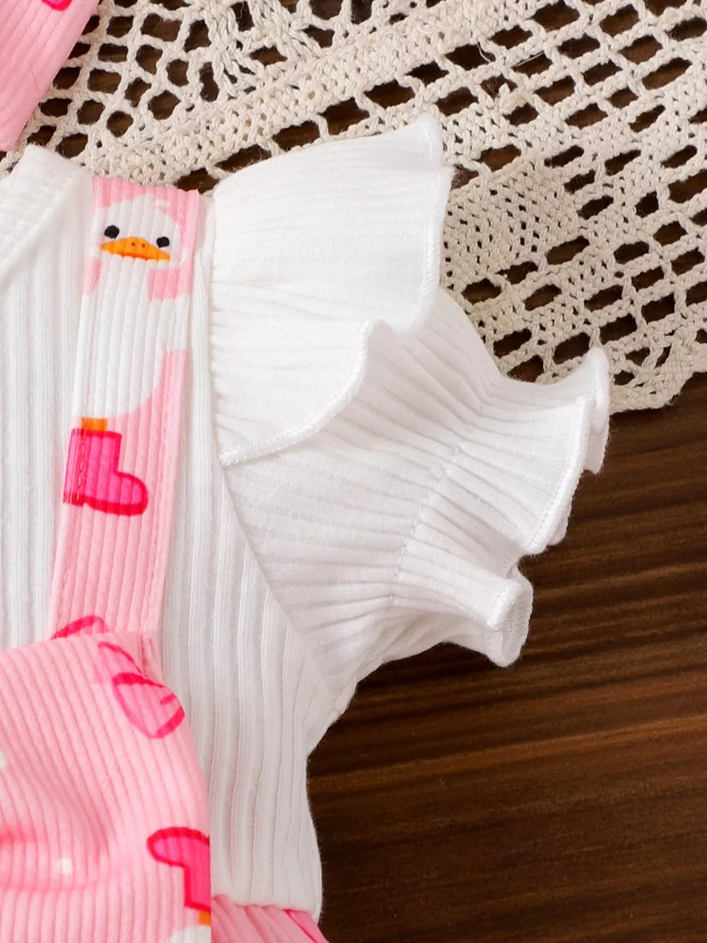 Children's Bow Duck Print Romper With Headband in Pink, fabric detail