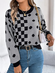 Gray knit sweater with checkerboard and dot intarsia pattern, crew neck, long sleeves.