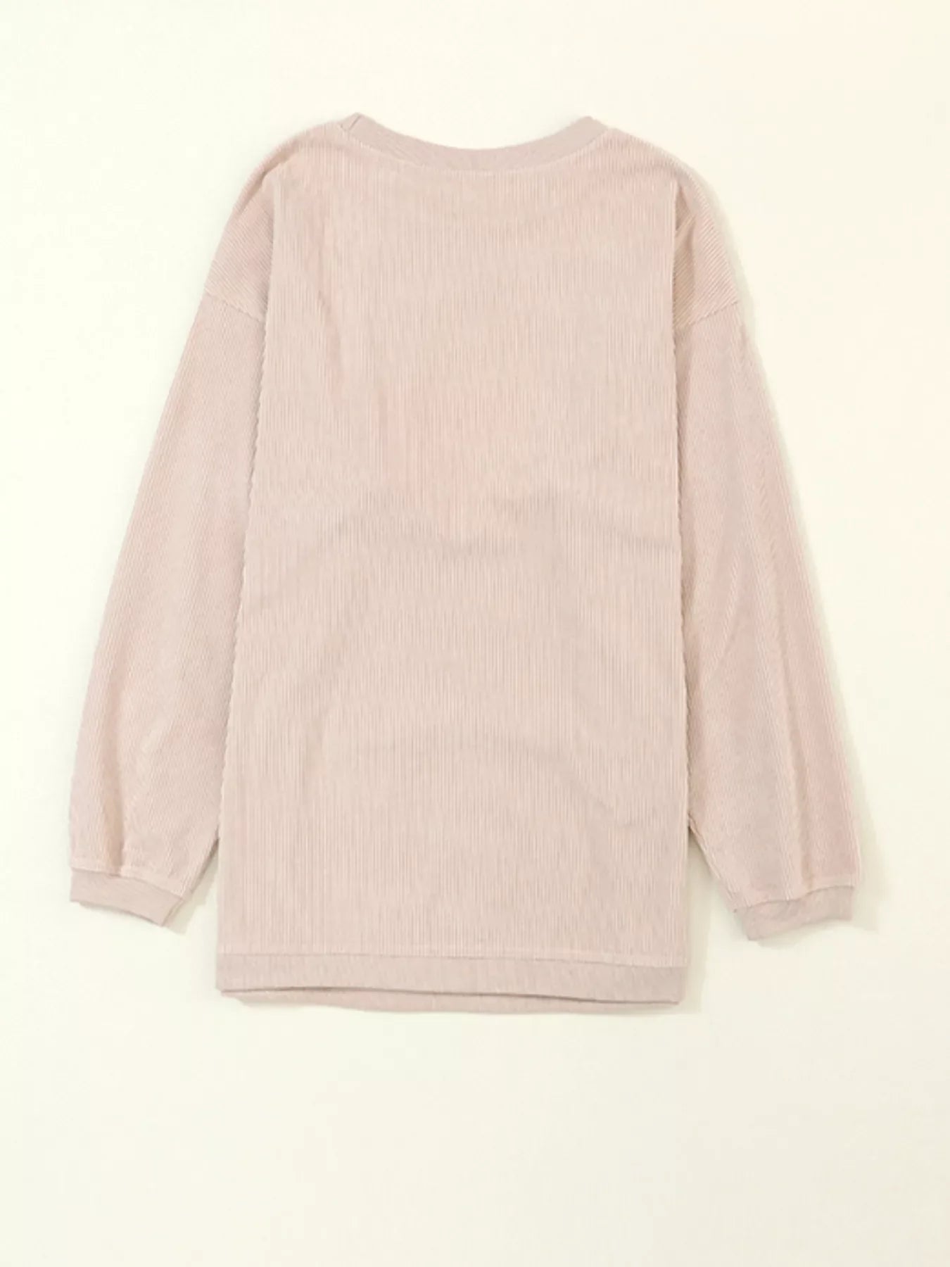 Eggshell corded sweatshirt with long sleeves and crewneck.