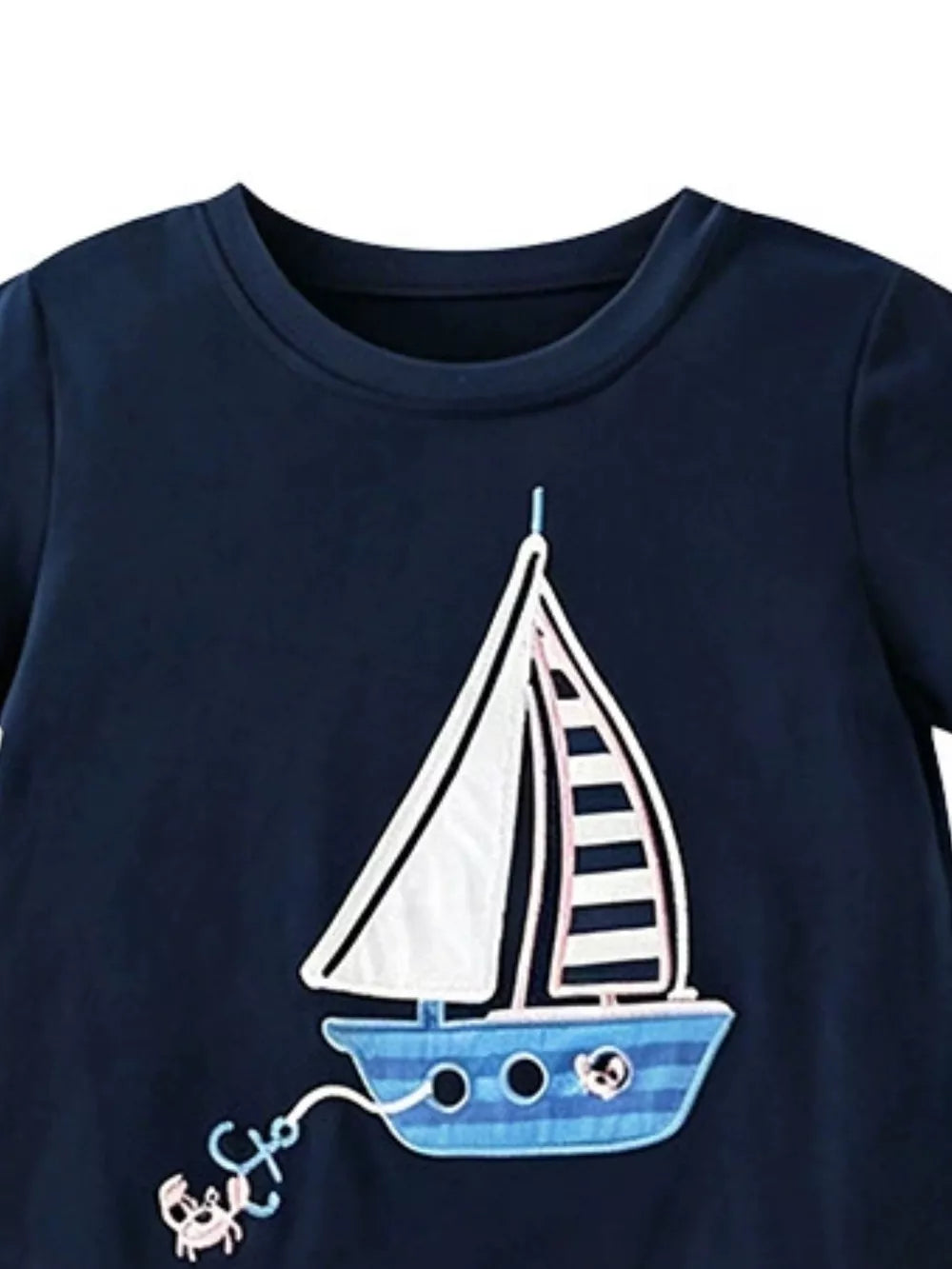Navy t-shirt with sailboat graphic and crab anchor detail