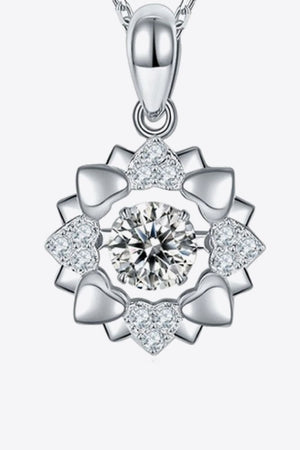 Silver heart-set diamond halo necklace in 925 sterling silver with a central sparkling stone.