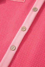 Waffle knit shacket in blush pink with button front and contrast trim.