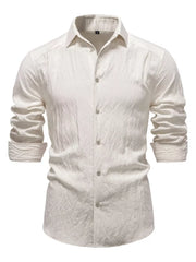 Elevated long sleeve button-up shirt in apricot with classic collar and textured cotton fabric.