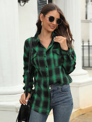 Plaid button-up shirt in dark green and black with two chest pockets.