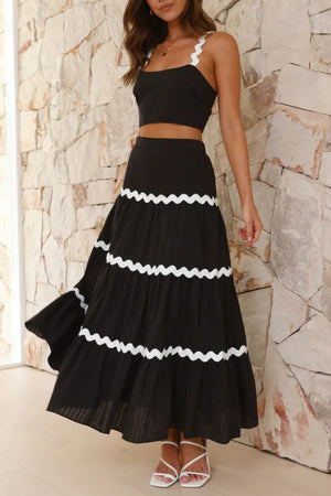 Black crop top and tiered maxi skirt set with white scalloped trim detail