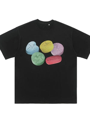 Black cotton crew neck t-shirt with graphic print of colorful pills.