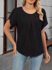 Black pleated short sleeve polyester blouse with scoop neck and split sleeves.