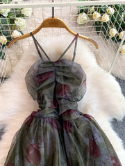 Romantic floral mesh maxi dress in Army Green with ruched bodice and ruffled hem.