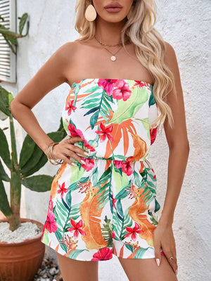 Strapless romper with colorful tropical floral print and elasticized waist.