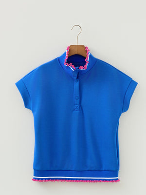 Blue polo shirt with frill collar and hem detail