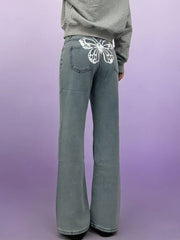 Light blue maternity jeans with butterfly back detail and wide leg