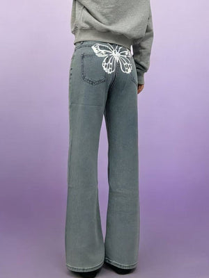 Light blue maternity jeans with butterfly back detail and wide leg