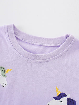 Lavender cotton toddler t-shirt with whimsical unicorn graphic and crew neck.