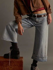 Light blue cotton blend cropped jeans with wide leg and large cuffs