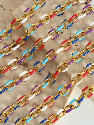 Gold link necklace with colorful enamel in red, blue, white, and purple.
