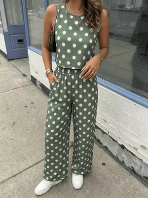 Green polka dot crop top and wide-leg pants set with a round neckline and sleeveless design.