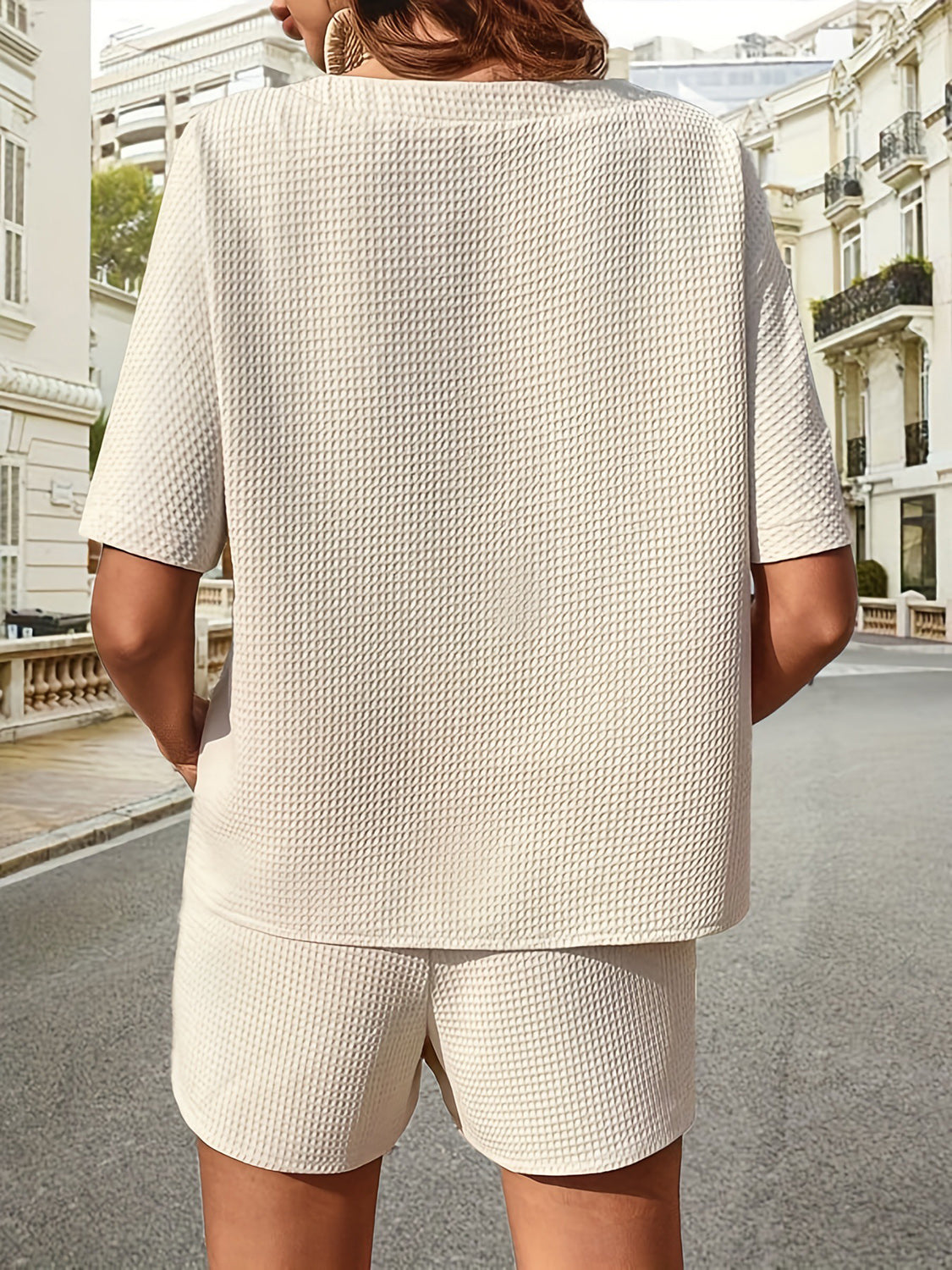 Beige waffle knit drawstring co-ord set with short sleeves and shorts.