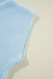 Light blue knit turtleneck shell sweater with textured stitch detail