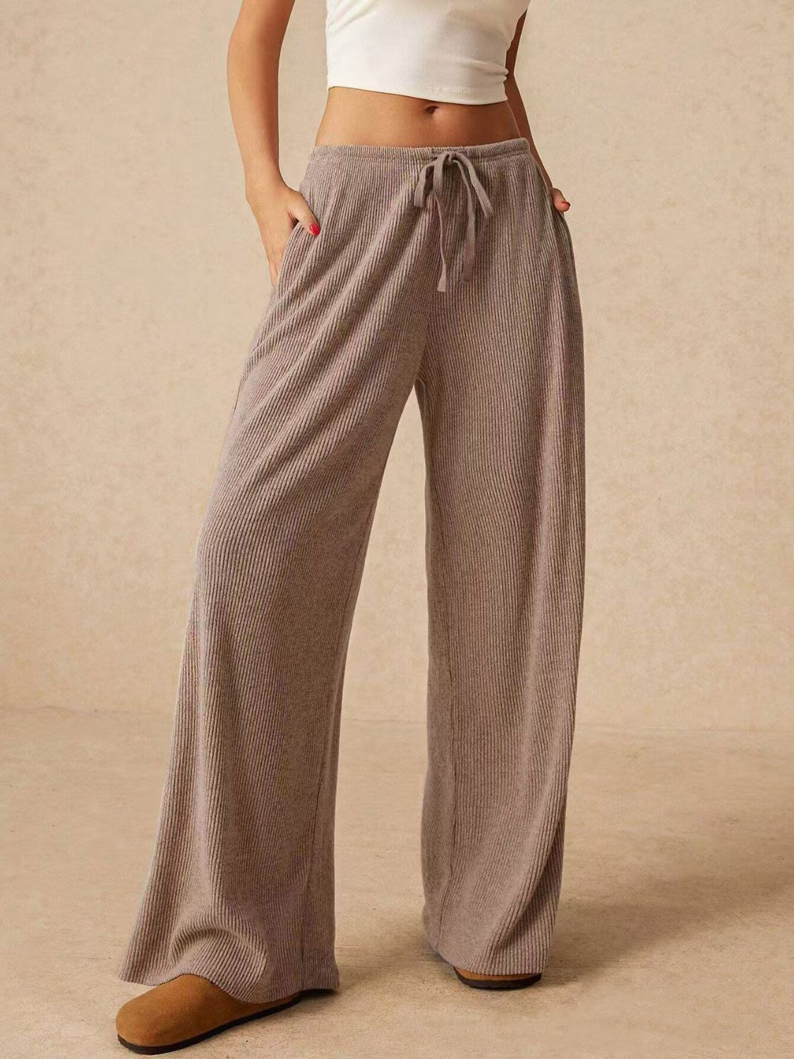 Mocha ribbed palazzo lounge trousers with drawstring waist and wide leg.