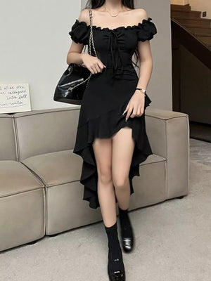 Black off-shoulder dress with ruffled asymmetrical hem and tie front detail