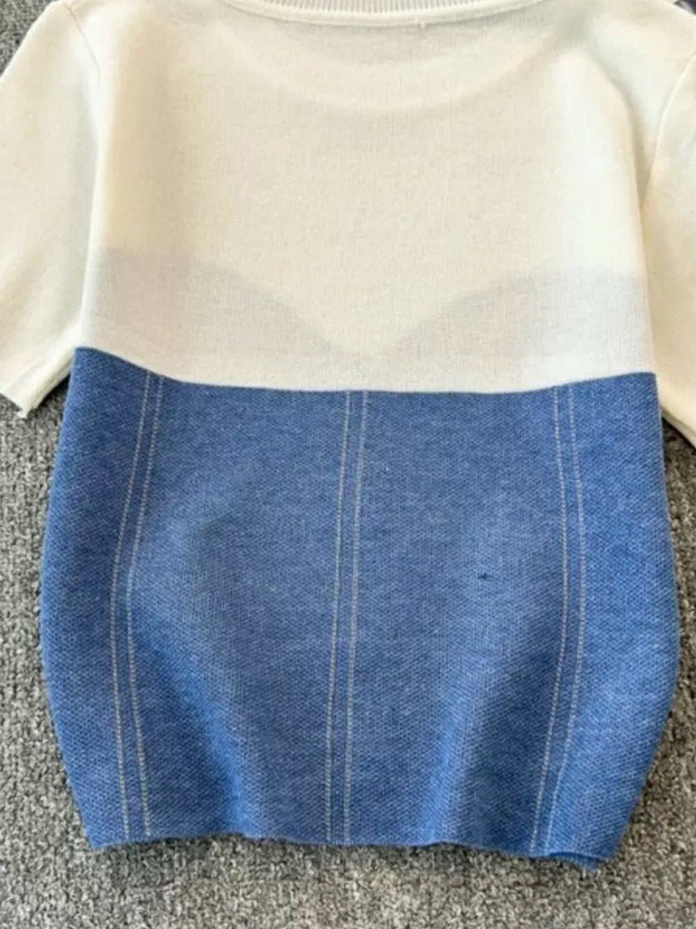 Color block knit t-shirt in white with blue, featuring ribbed detail and vertical seams.