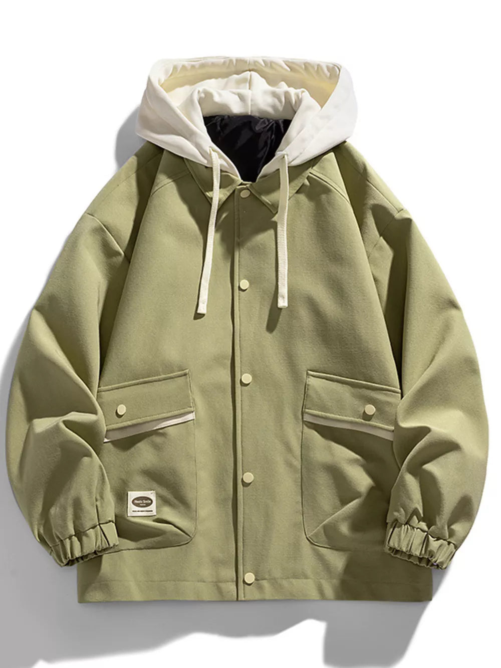 Light green hooded button-up jacket with white drawstring and buttoned flap pockets.