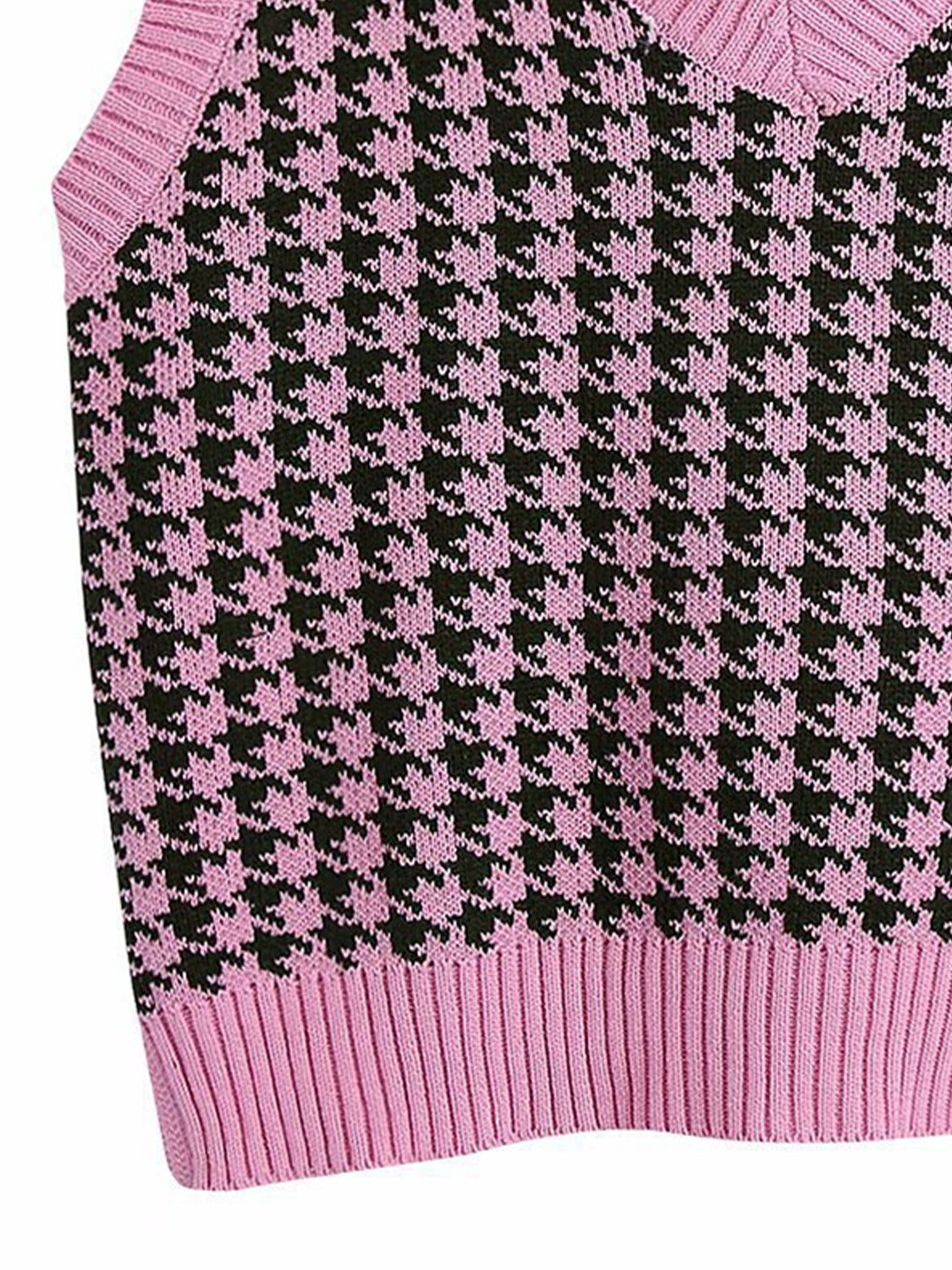 Houndstooth knit v-neck tank top in pink and black with ribbed hem.