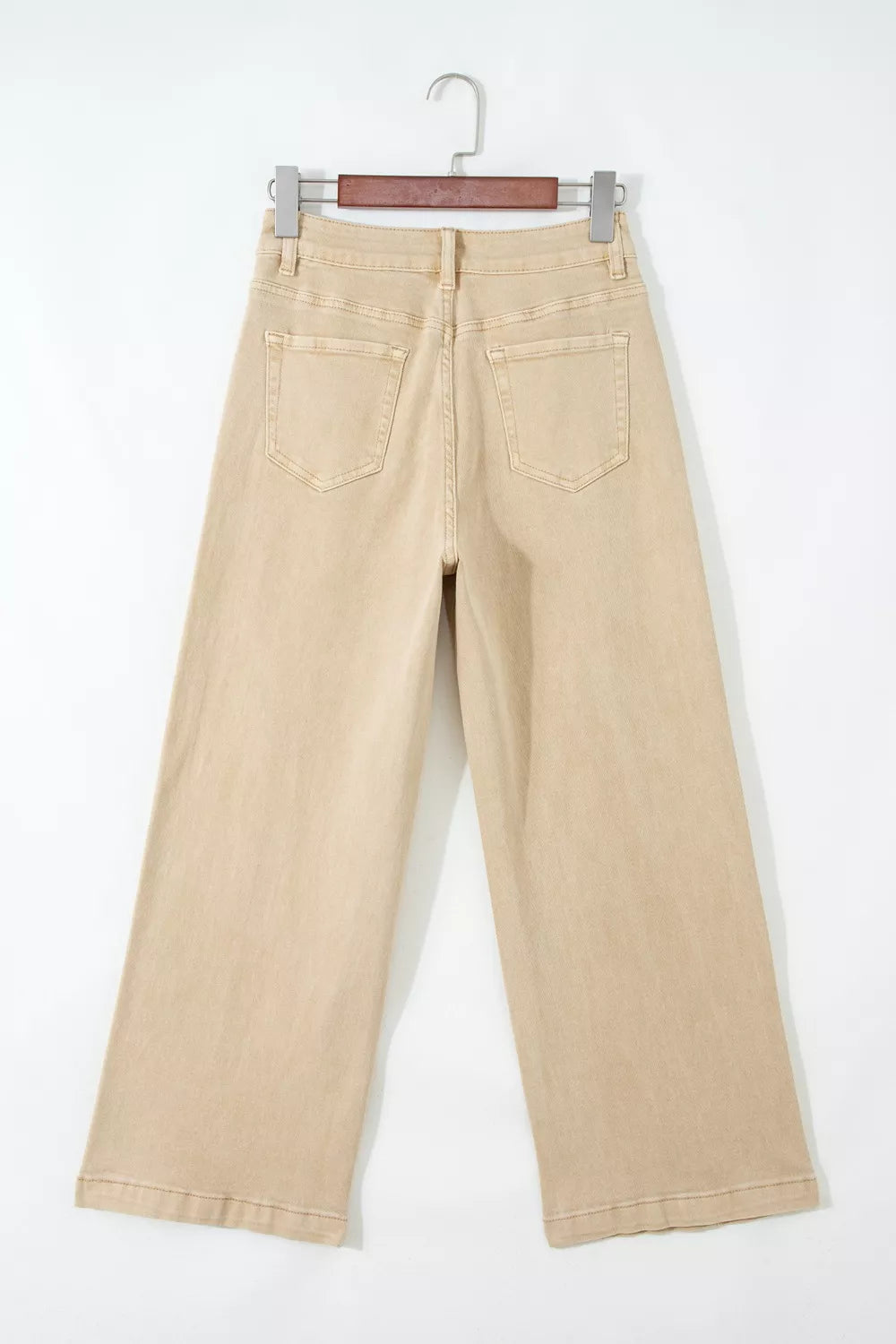 High-waisted cropped wide-leg jeans in beige denim with back pockets.
