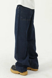 Baggy dark wash denim jeans with a wide leg silhouette and square back pockets.