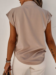 Camel V-neck blouse with cap sleeves and curved hem.