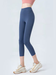 Dusty blue capri leggings with a high waistband and subtle seam detail.
