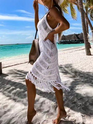 White macramé chevron cover-up dress with fringe hem and V-neck.