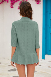 Sage perforated peplum sleeve cardigan with 3/4 sleeves and ruffled hem.