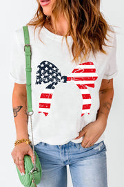 White t-shirt with distressed American flag bow graphic, crew neck, short sleeves.