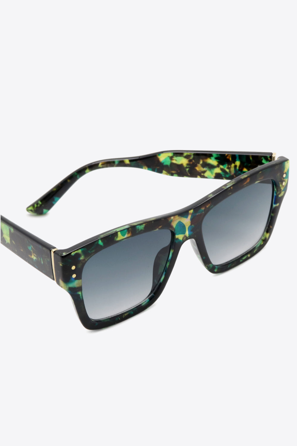 Prismatic square frame sunglasses with a multi-color tortoise shell pattern and gradient lenses.