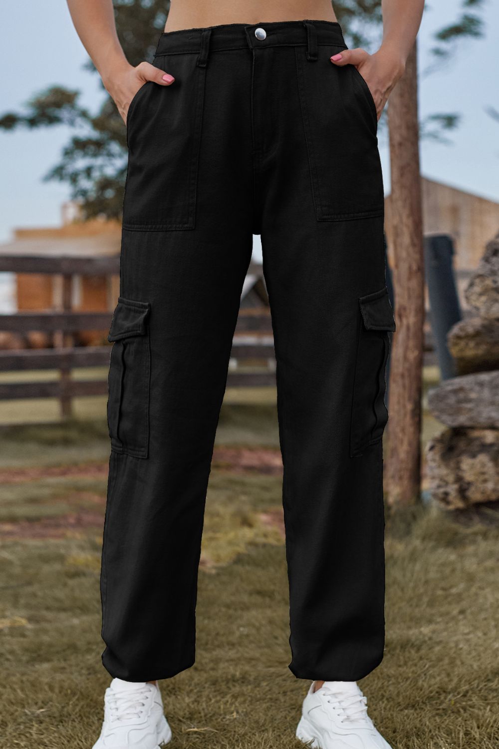 Black utility cargo pants with multiple pockets and a relaxed fit.