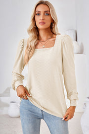 Ivory diamond-textured puff sleeve top with square neckline