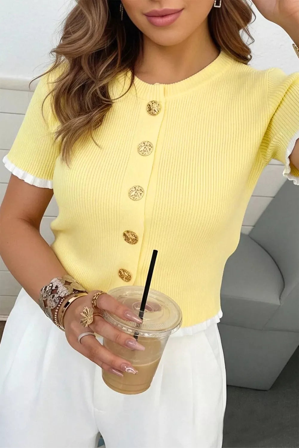 Yellow ribbed short sleeve cardigan with frilled trim and gold buttons