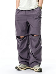 Gray cargo pants with adjustable waist and zip-off legs, shown as shorts.