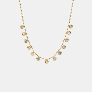 Gold-plated necklace with dangling pavé charms on a beaded chain