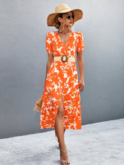 Orange-red floral print midi dress with puff sleeves and a V-neck.