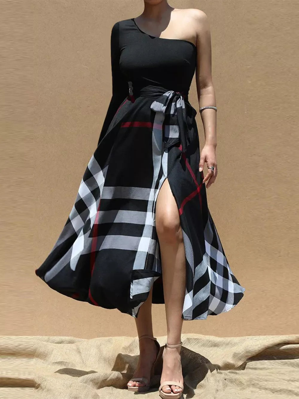 Black asymmetrical midi dress with plaid skirt and waist tie