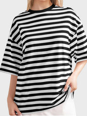 Oversized black and white striped tee with dropped sleeves and crew neck.